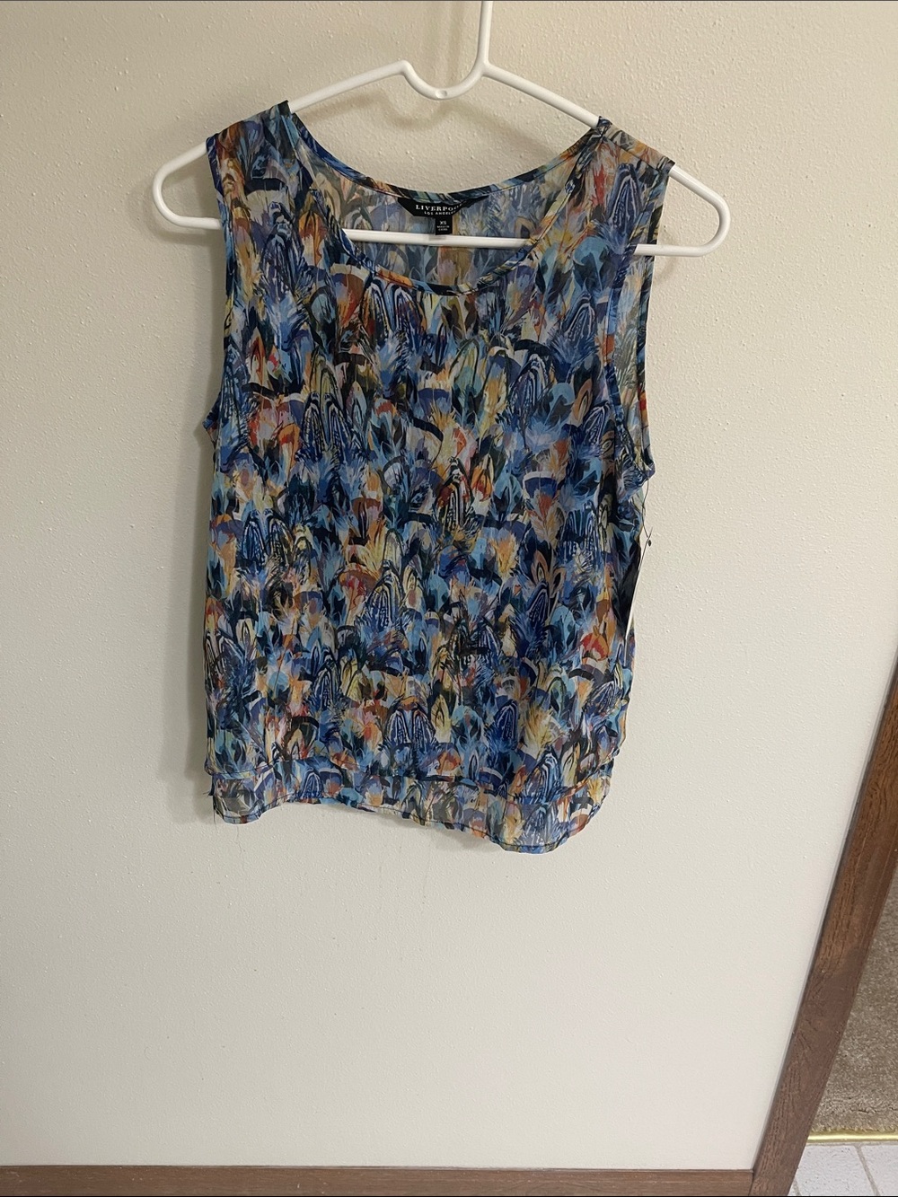 Women’s beautiful blue multicolored Sleeveless top.